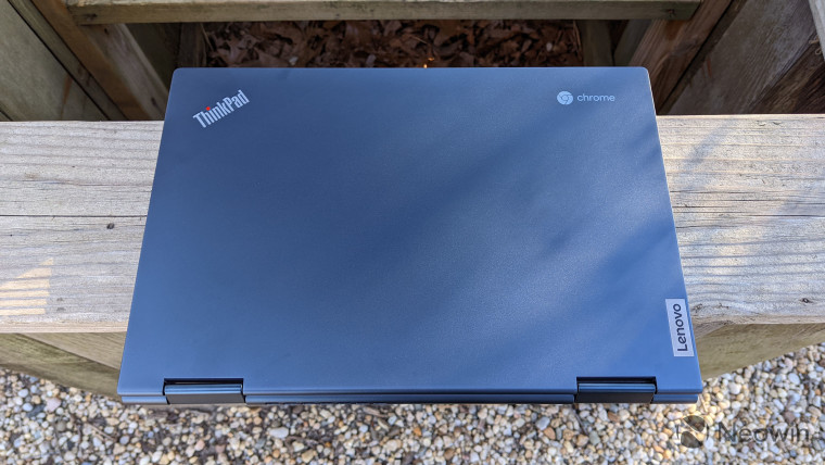 Lenovo ThinkPad C13 Yoga in blue, on top of wood